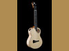 curly maple and spruce ukulele with a spruce top