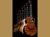 7 DeVine Ukuleles including koa and maple ukuleles