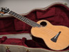 This tenor ukulele has a 100+ year old cedar top with african blackwood back and sides.