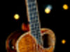 The Muse tenor ukulele with the signature fretboard inlay in bamboo